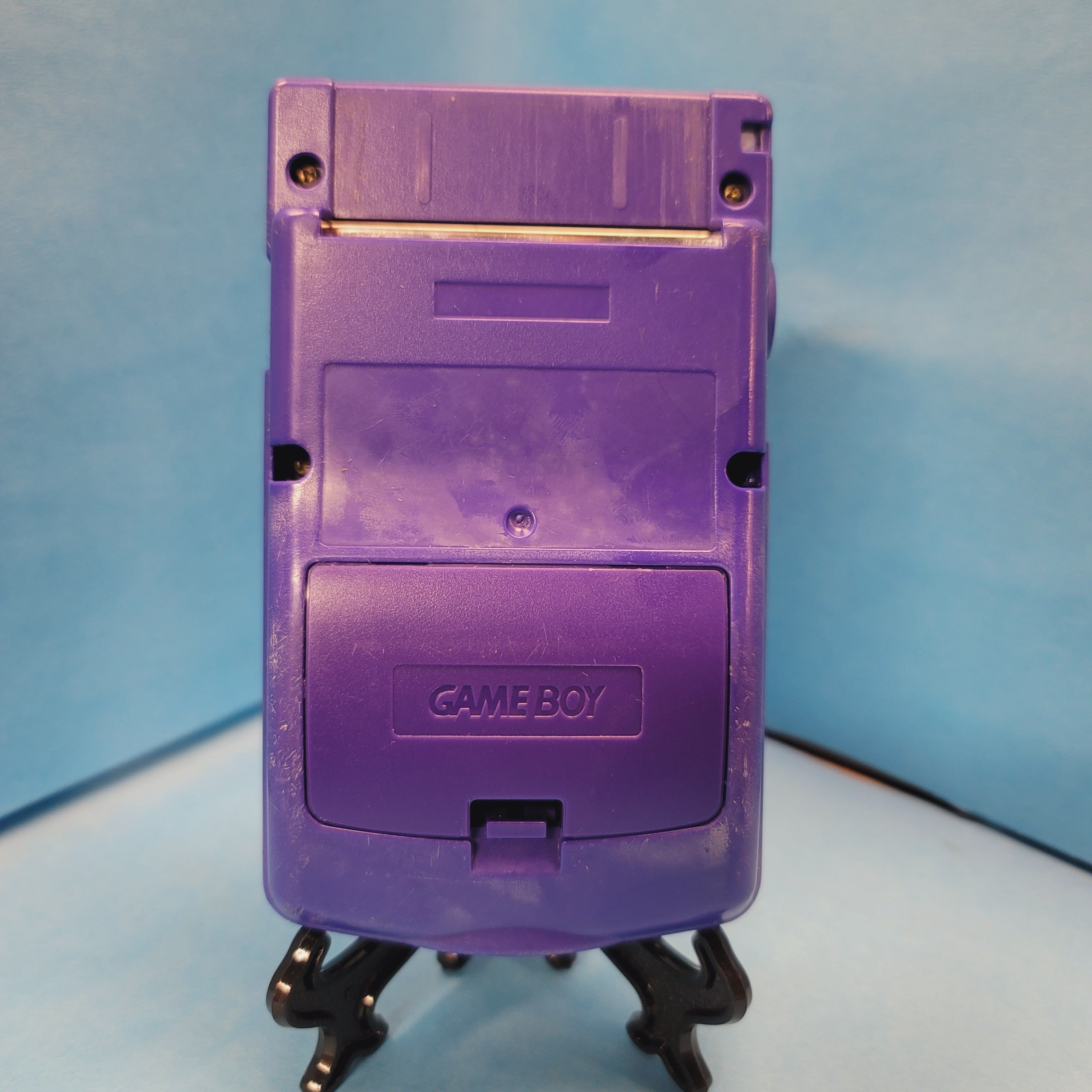 Système de couleurs Game Boy (violet atomique/raisin)