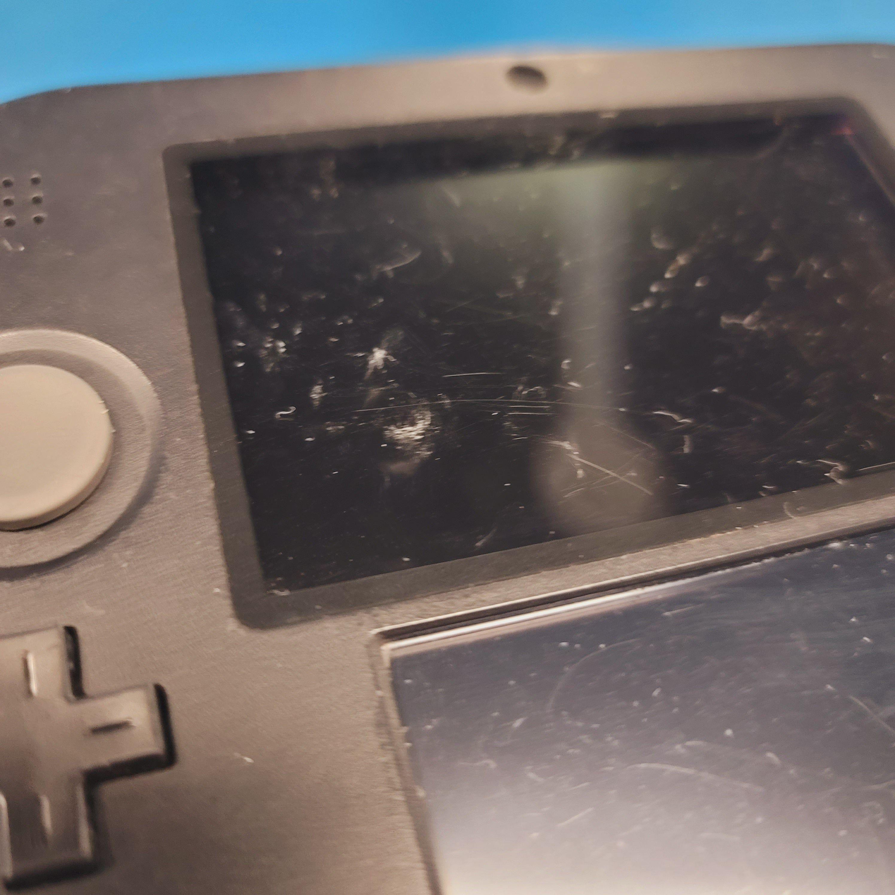 Système 2DS (noir et rouge / dommages cosmétiques mineurs)