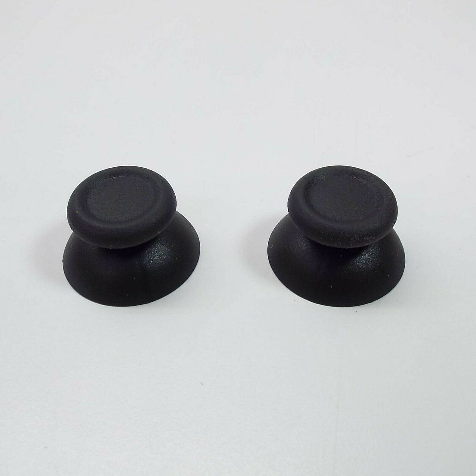 Bâtons de pouce noirs de remplacement pour manette PS4 (paquet de deux)